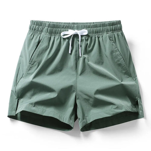 2026 new summer men's sports and leisure shorts with pockets, solid color, lightweight, suitable for jogging and beach wear