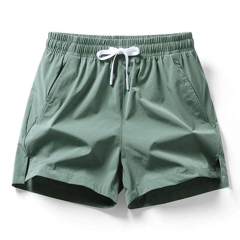 2026 new summer men's sports and leisure shorts with pockets, solid color, lightweight, suitable for jogging and beach wear