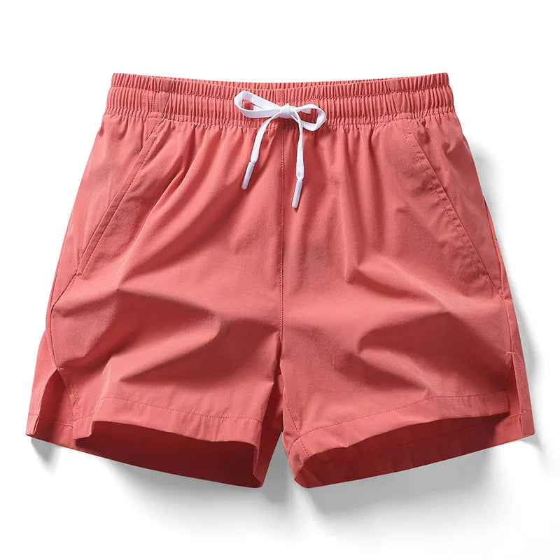 2026 new summer men's sports and leisure shorts with pockets, solid color, lightweight, suitable for jogging and beach wear
